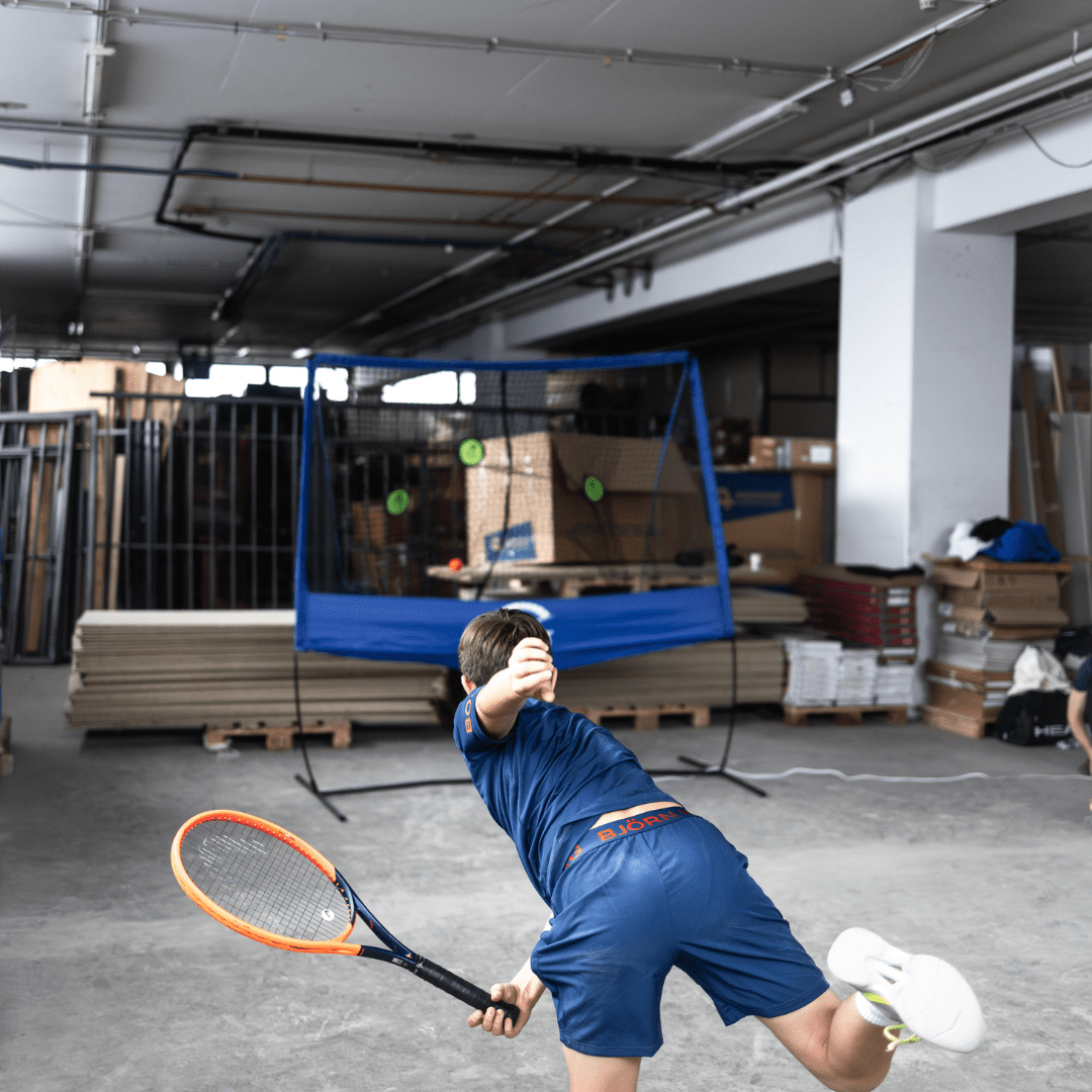 Fast Track Tennis rebounder net with ball machine